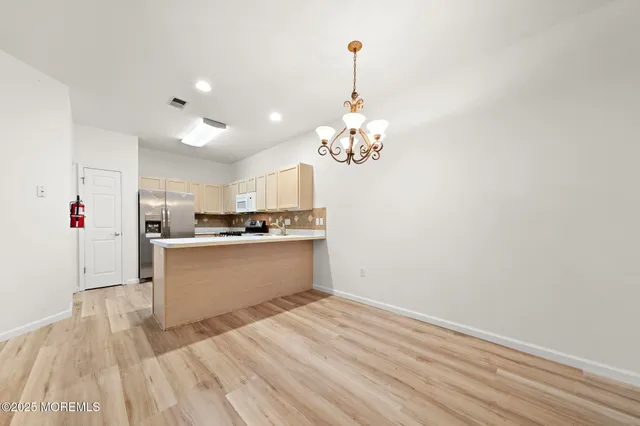 a very nice looking room with a wooden floor