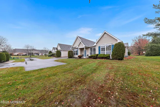 a view of a house with a big yard