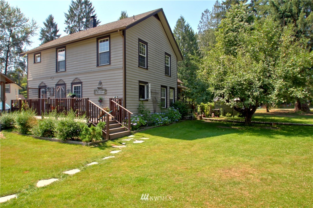 30217 Oso Loop Road Arlington, WA 98223 - Photo 12 of 34 a house view with a garden space