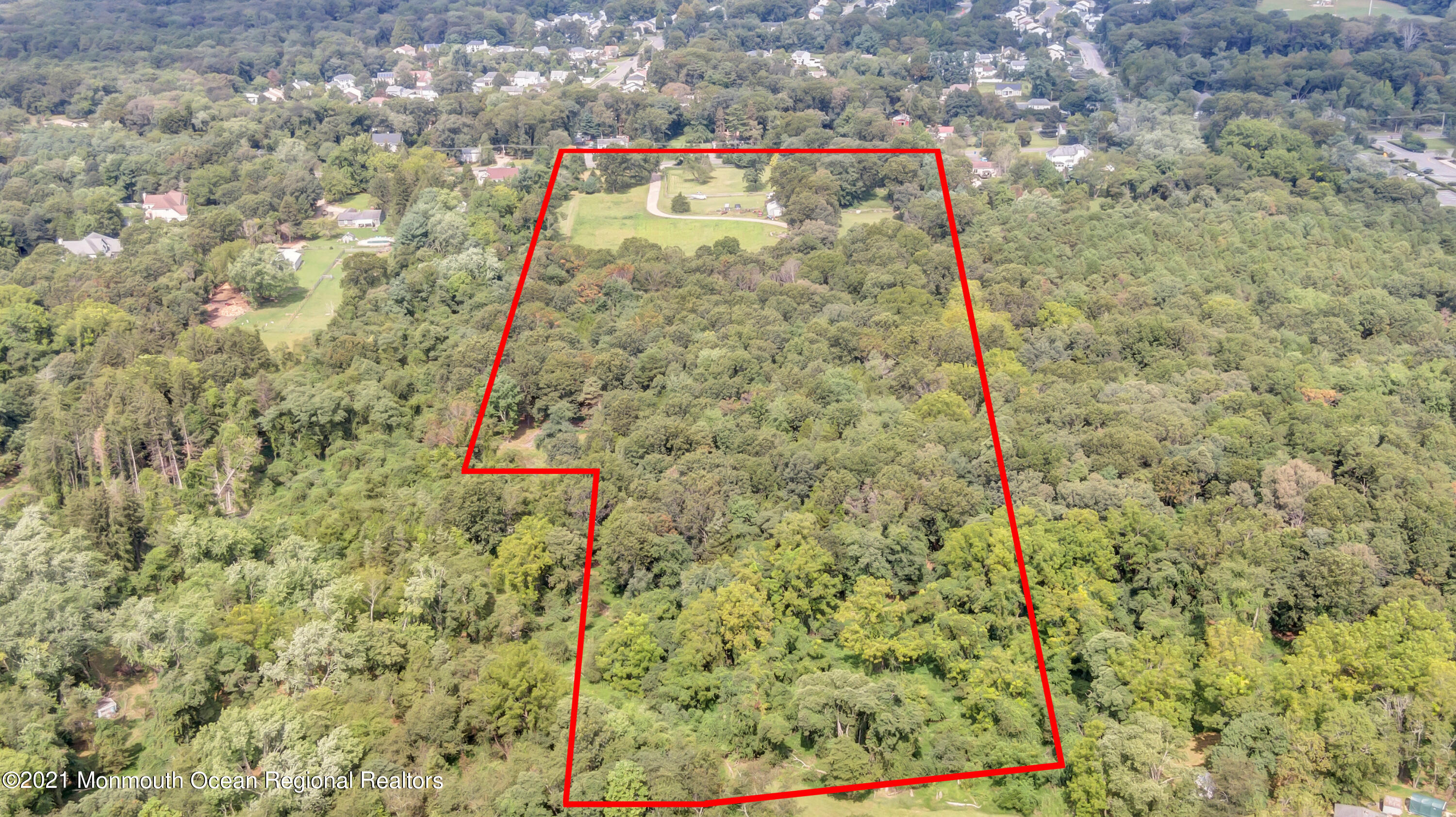 57 Church Road Howell, NJ 07731 - Photo 5 of 5 a view of a tall tree