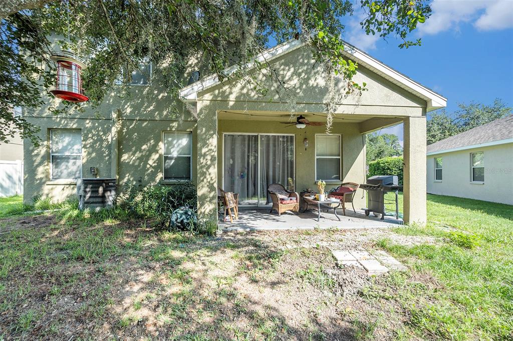 11808 Colony Lakes Boulevard New Port Richey, FL 34654 - Photo 22 of 25 a view of a house with backyard and sitting area