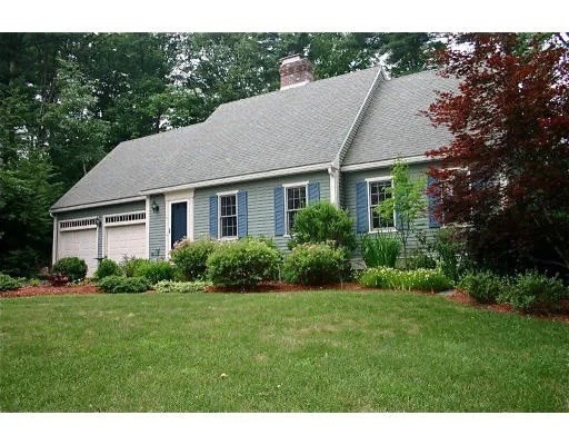 8 Caleb Road Shirley, MA 01464 - Photo 1 of 42 a aerial view of a house with a yard