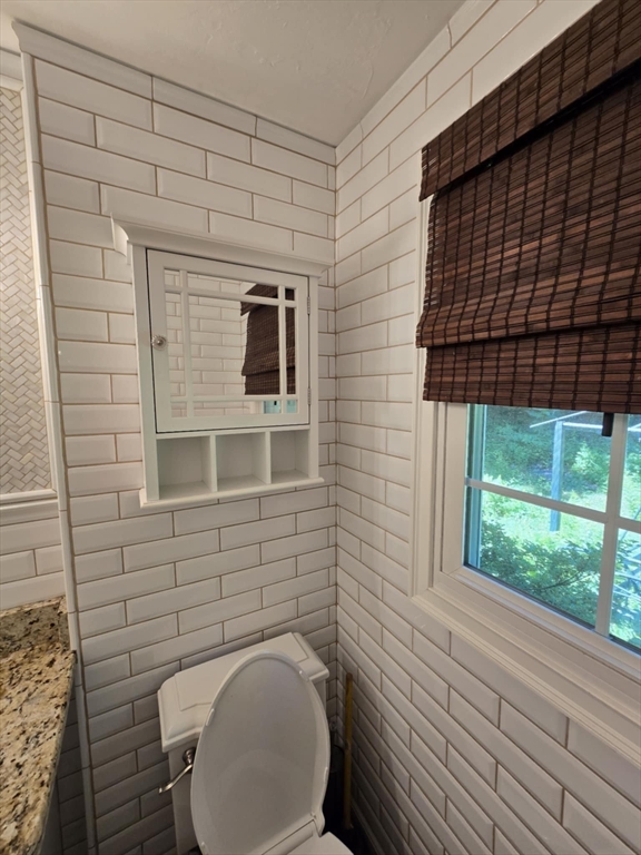 8 Caleb Road Shirley, MA 01464 - Photo 17 of 42 a bathroom with a toilet and a shower