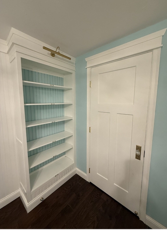 8 Caleb Road Shirley, MA 01464 - Photo 26 of 42 a view of walk in closet with empty racks