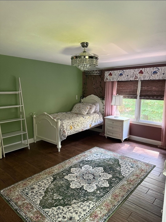 8 Caleb Road Shirley, MA 01464 - Photo 39 of 42 a bedroom with a bed window and a couch