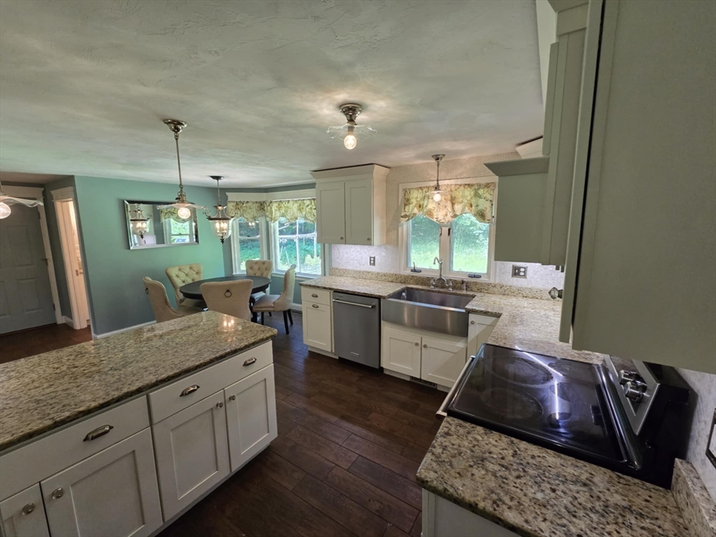 8 Caleb Road Shirley, MA 01464 - Photo 10 of 42 a kitchen with a sink appliances and cabinets