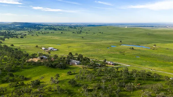 a view of an ocean and a yard