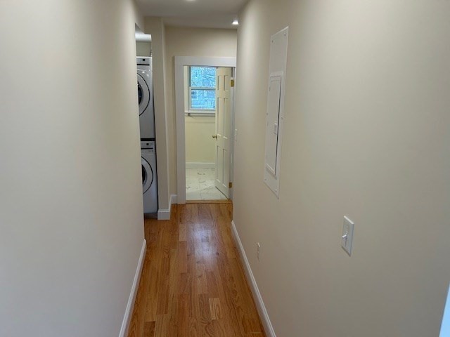 1599 Washington Street, Unit 2 Newton, MA 02465 - Photo 20 of 34 a view of a hallway with wooden floor
