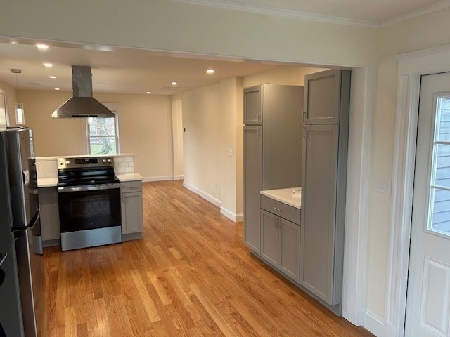 1599 Washington Street, Unit 2 Newton, MA 02465 - Photo 4 of 34 a view of a kitchen with a sink and an oven