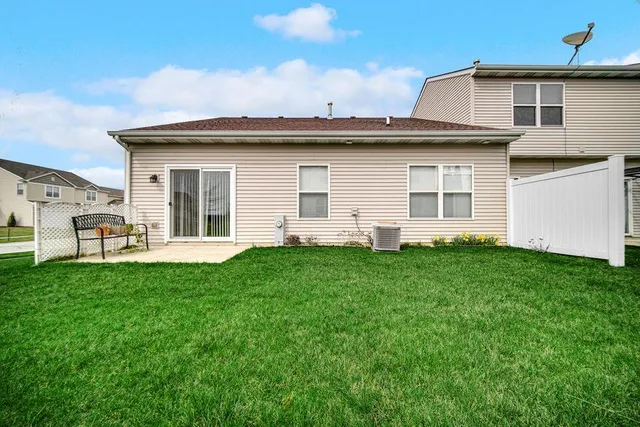 a view of a backyard with plants