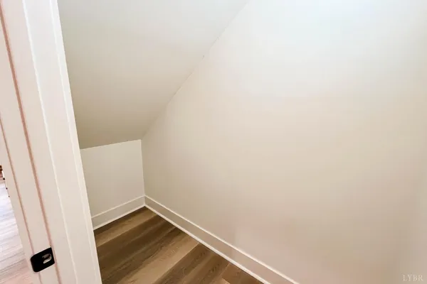 a bathroom with a shower and toilet