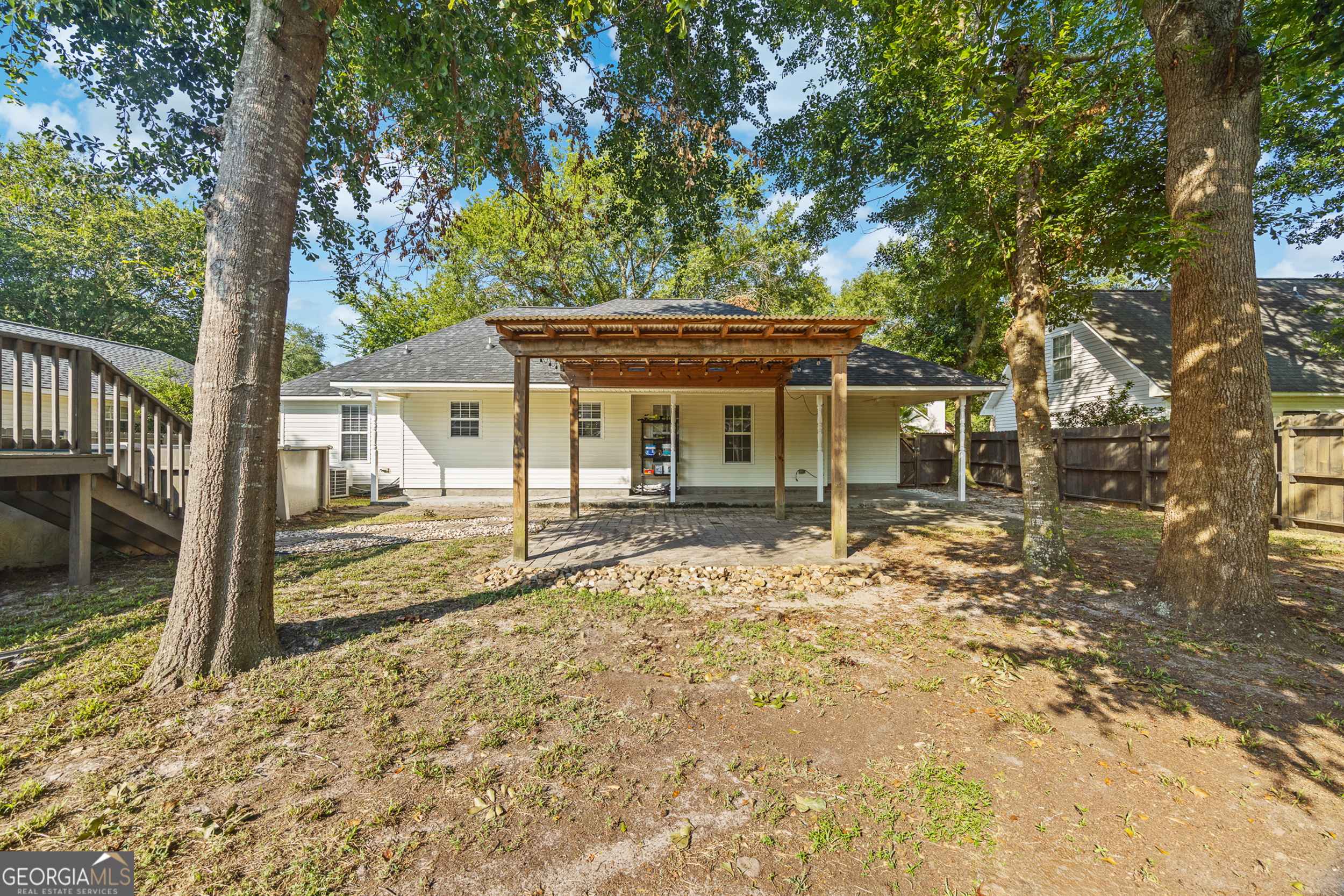 108 Crossing Circle Rincon, GA 31326 - Photo 22 of 26 front view of a house with a large tree