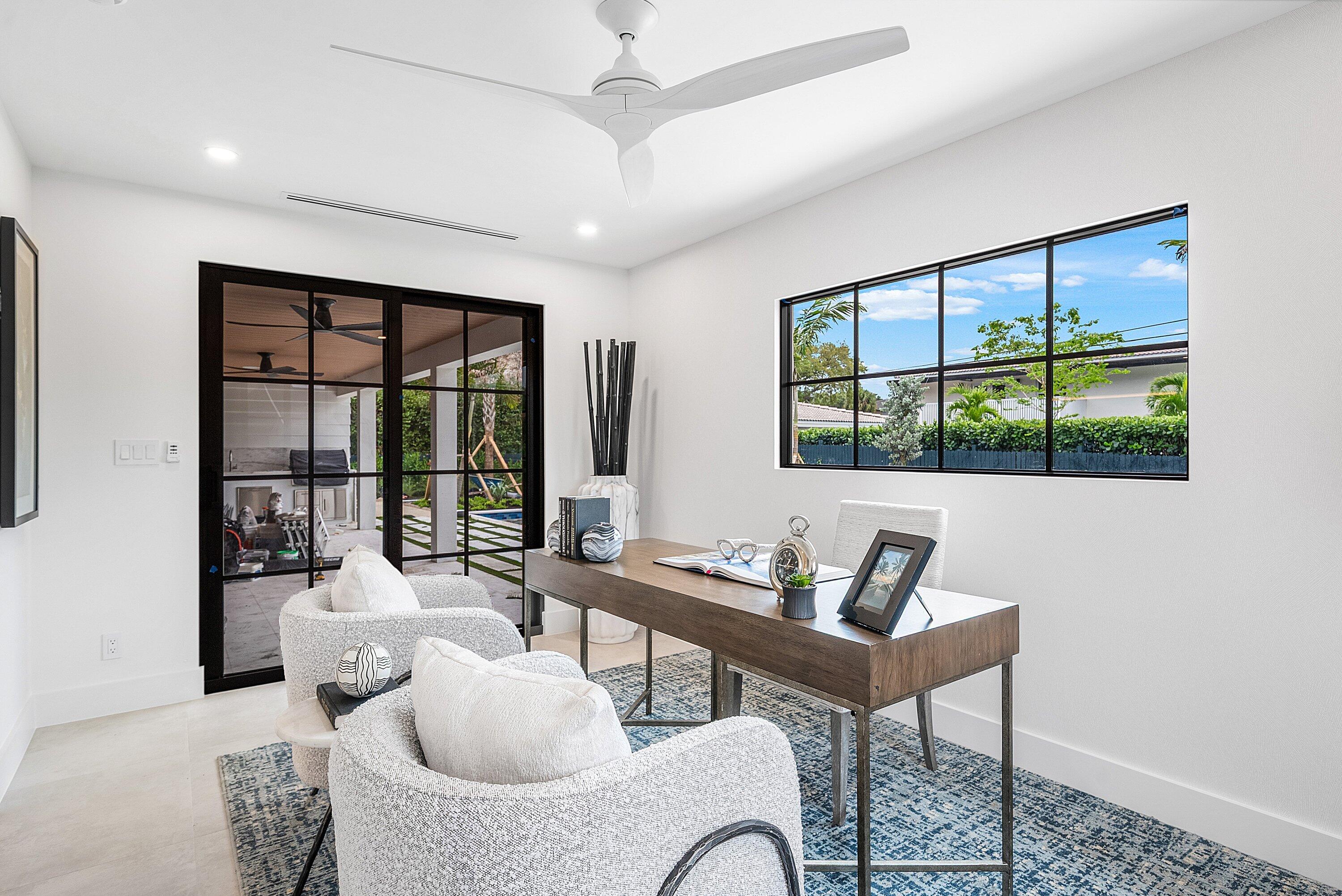 478 Northwest 13th Street Boca Raton, FL 33432 - Photo 14 of 38 a living room with furniture and a window
