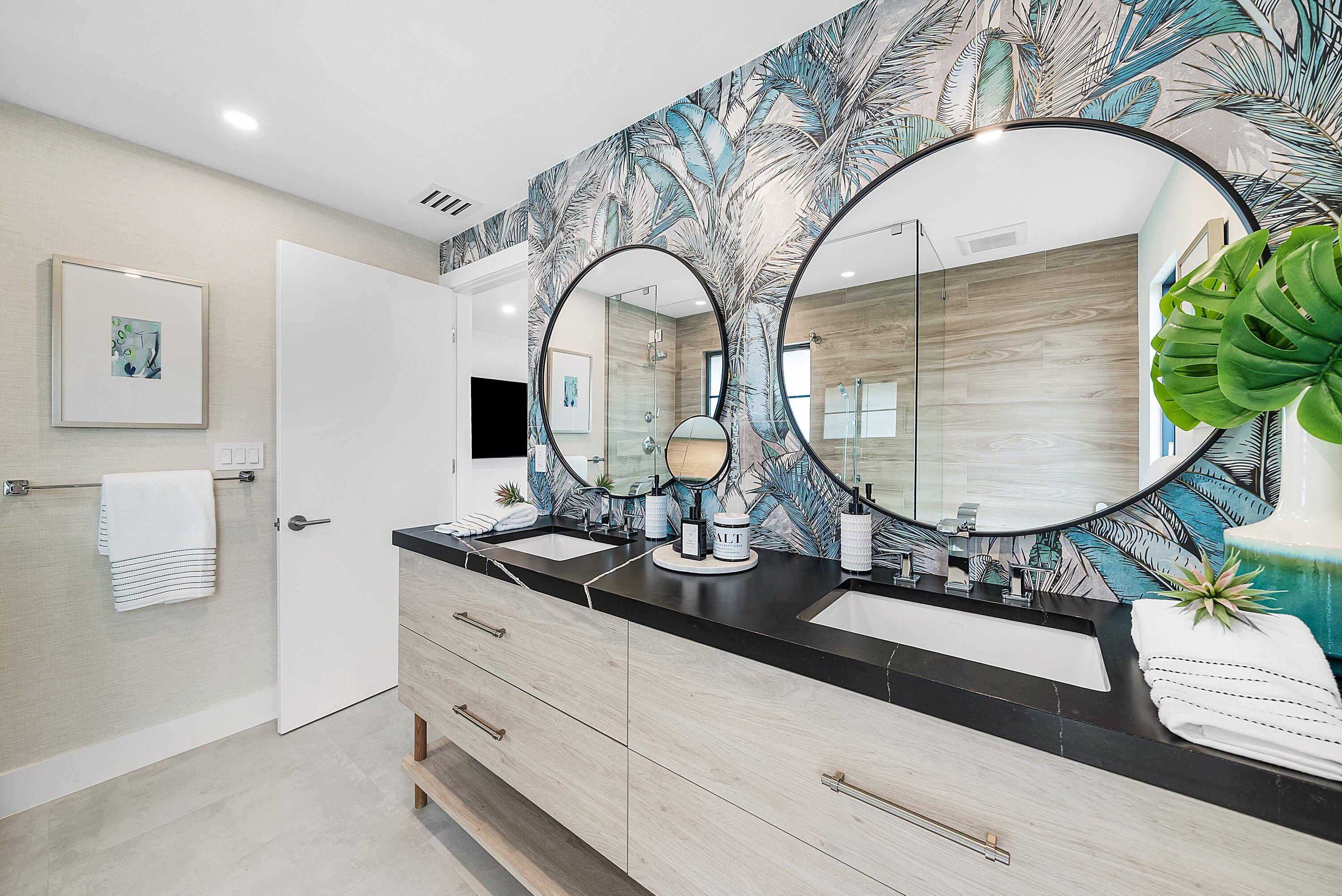 478 Northwest 13th Street Boca Raton, FL 33432 - Photo 23 of 38 a bathroom with a double vanity sink and a mirror