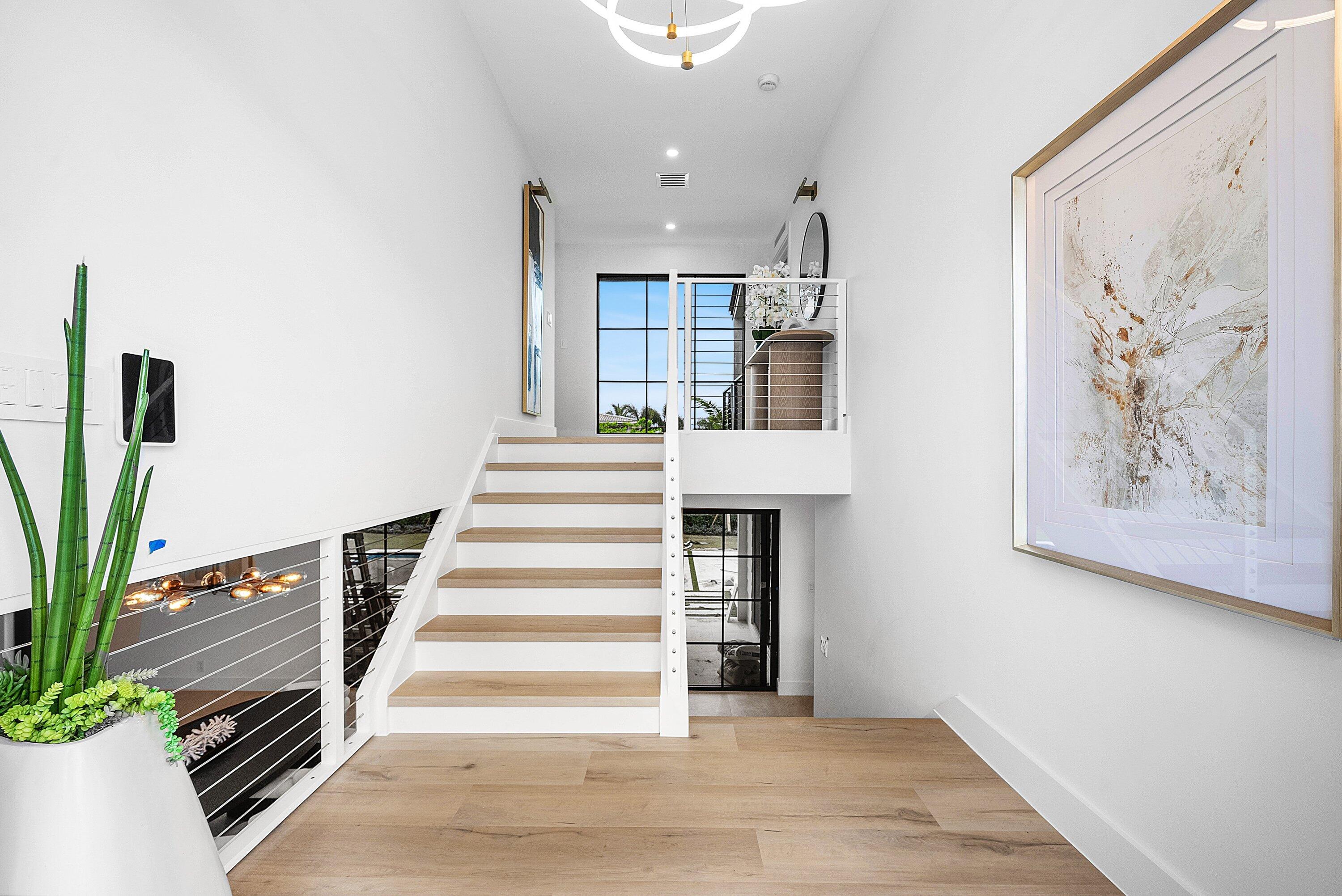 478 Northwest 13th Street Boca Raton, FL 33432 - Photo 3 of 38 a view of entryway and hall with wooden floor