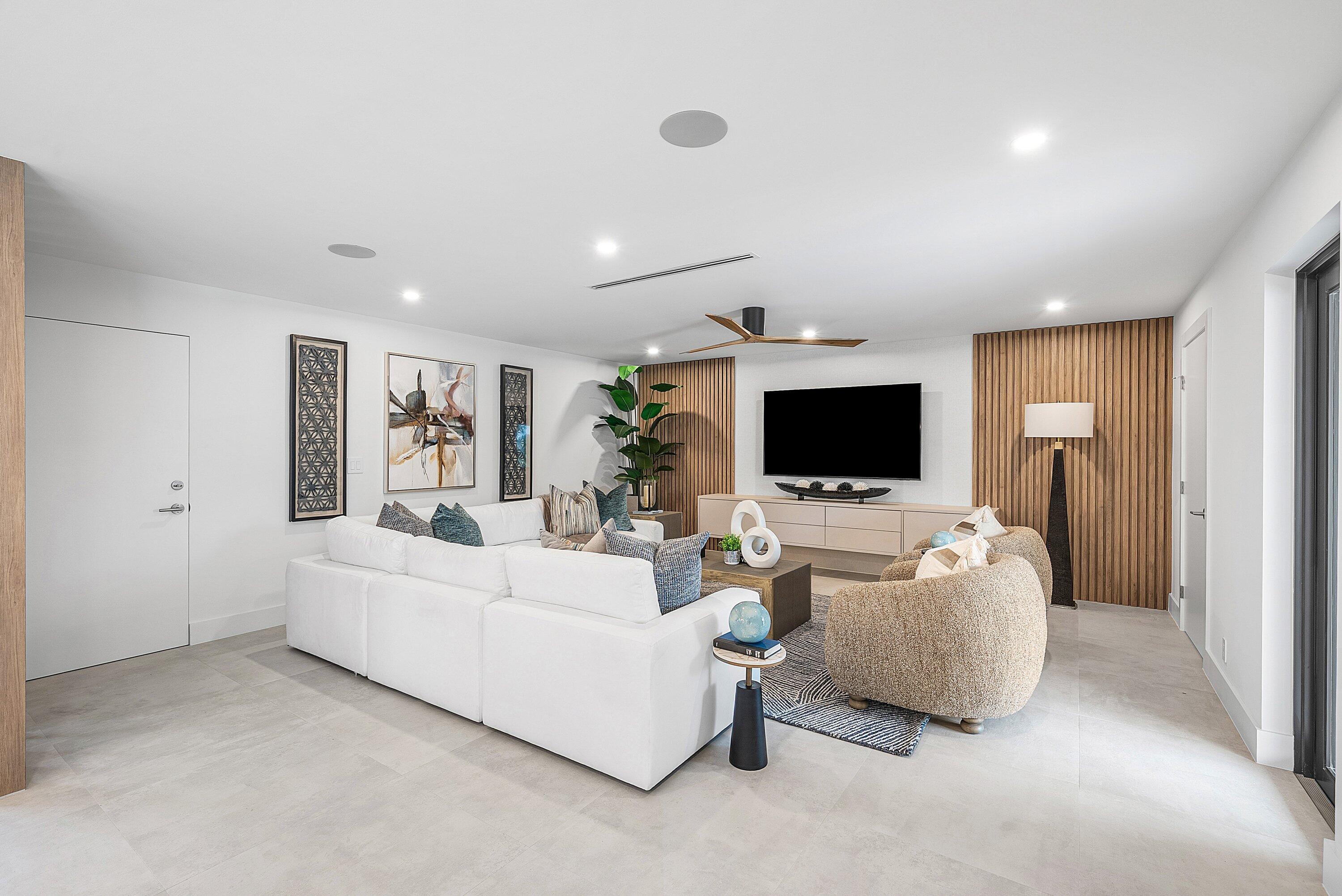 478 Northwest 13th Street Boca Raton, FL 33432 - Photo 6 of 38 a living room with furniture and a flat screen tv