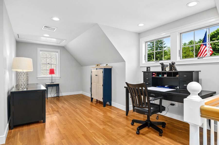 80 Old Kings Road Cotuit, MA 02635 - Photo 17 of 47 a livingroom with workspace and a window