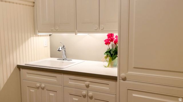 426 West Center Street Parowan, UT 84761 - Photo 71 of 107 Utility sink with chrome faucet, integrated into a countertop with under-cabinet lighting