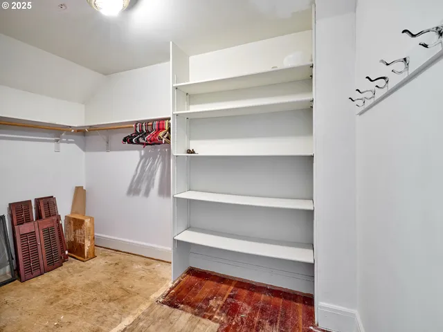 a view of a room with shelves