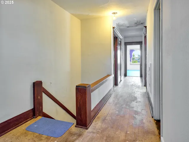 a view of hallway with stairs