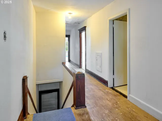 a view of a hallway with entryway