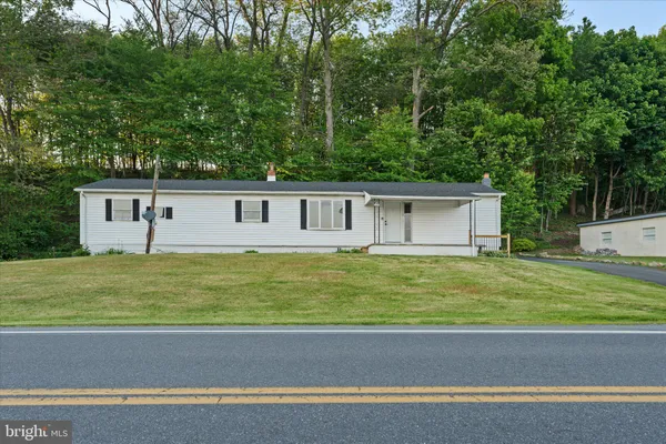 a view of a house with a swimming pool
