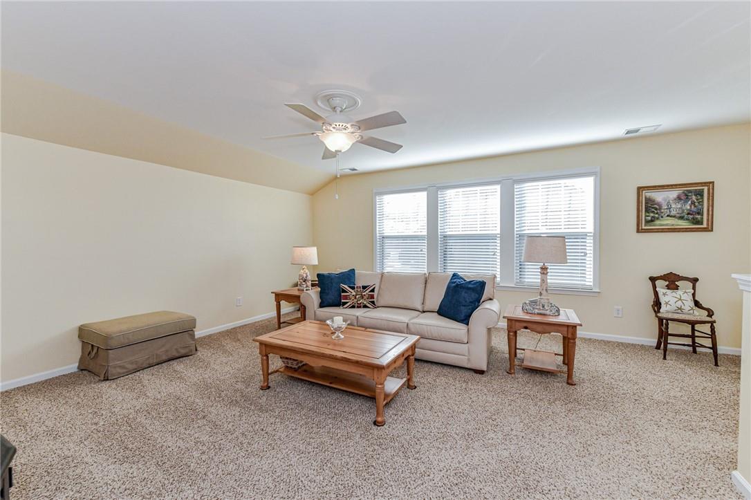 1223 Gold Rush Court Fort Mill, SC 29708 - Photo 30 of 39 a living room with furniture and a large window