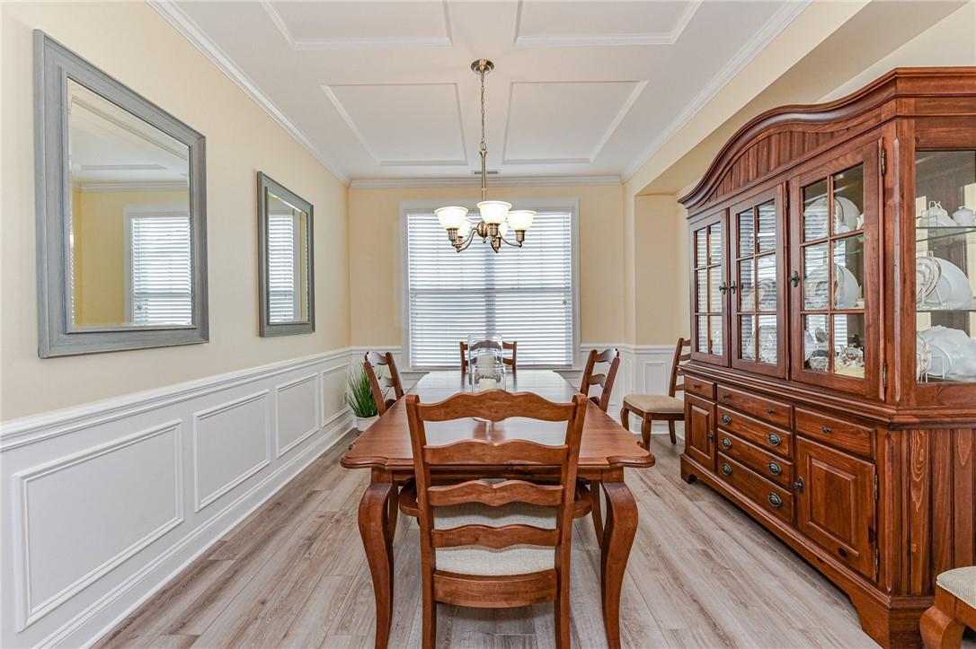 1223 Gold Rush Court Fort Mill, SC 29708 - Photo 8 of 39 a view of a dining room with furniture window and wooden floor