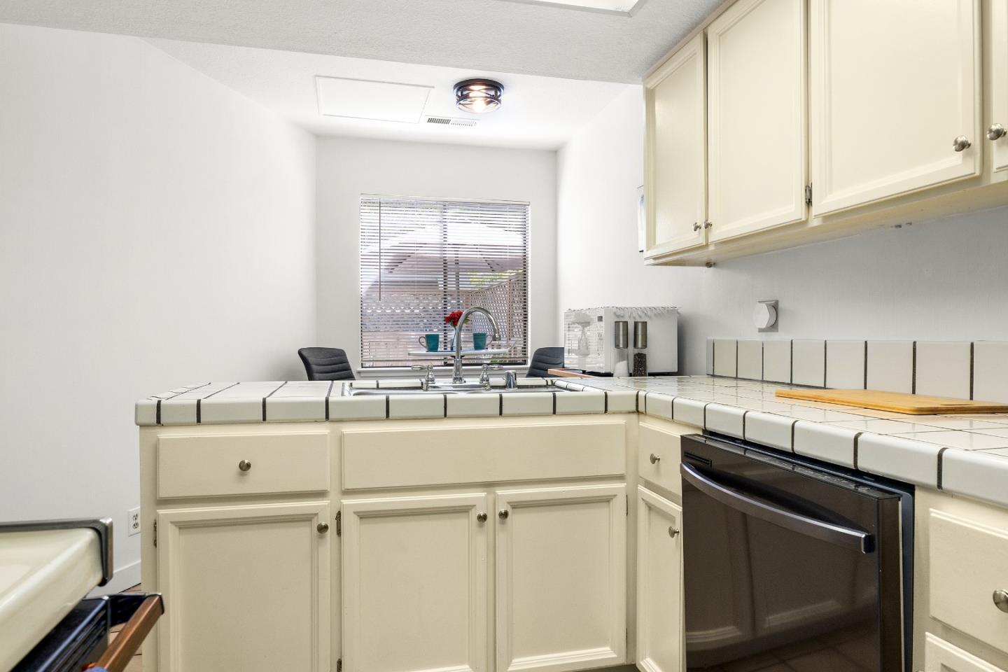 3205 Stockbridge Lane Santa Cruz, CA 95065 - Photo 12 of 30 a kitchen with a sink cabinets and appliances