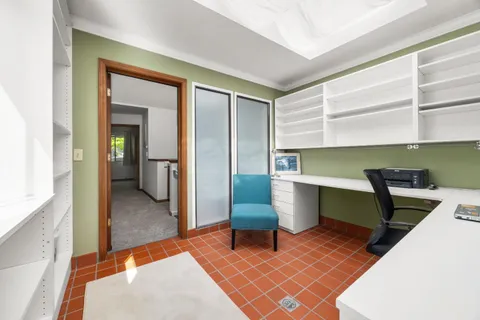a view of a room with a lounge chair