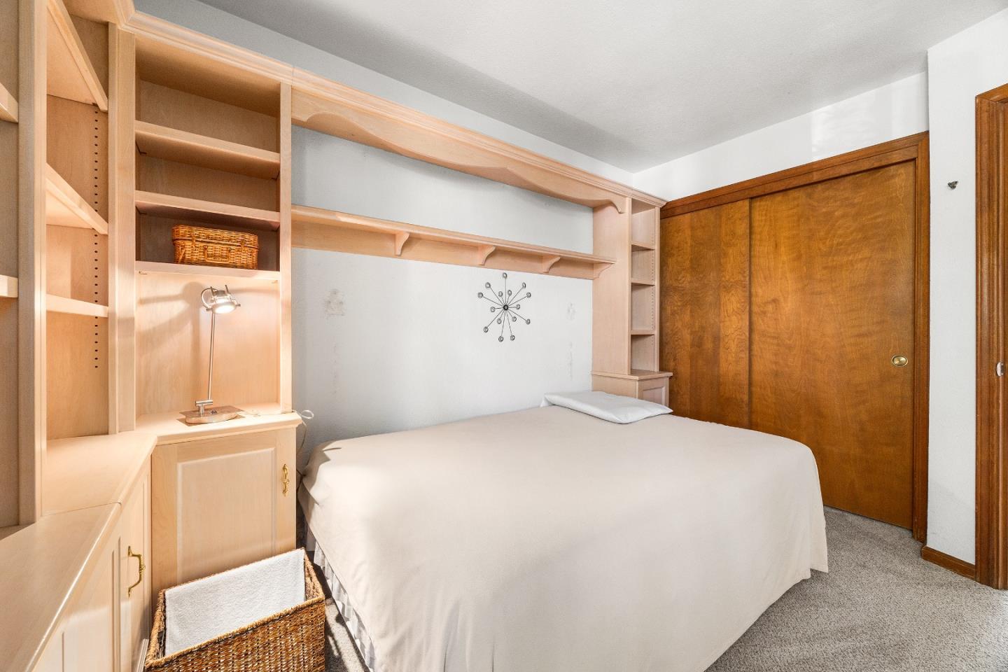 3205 Stockbridge Lane Santa Cruz, CA 95065 - Photo 19 of 30 a bedroom with a bed and a window