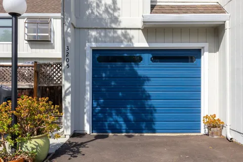 a front view of a house with a garage