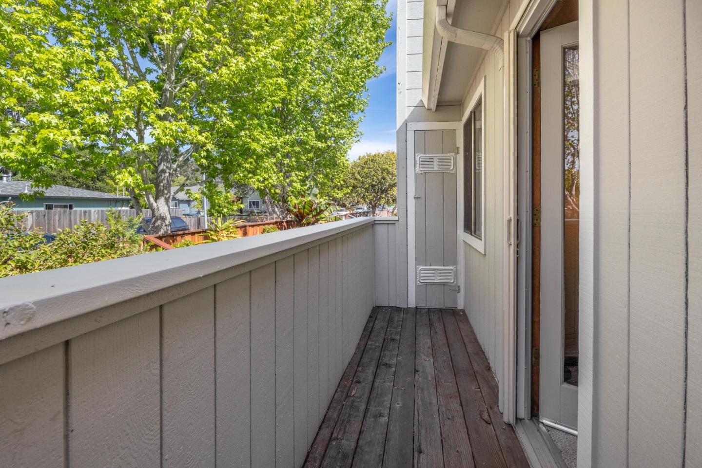 3205 Stockbridge Lane Santa Cruz, CA 95065 - Photo 29 of 30 a view of a balcony with wooden floor and fence