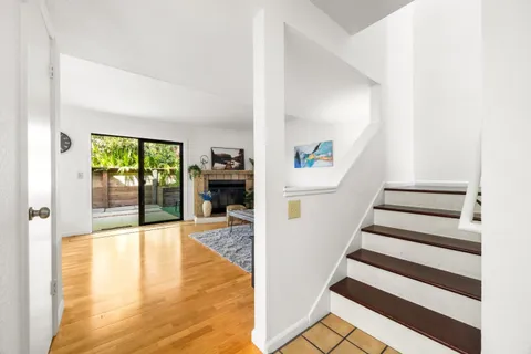 a view interior of a house with wooden floor and windows