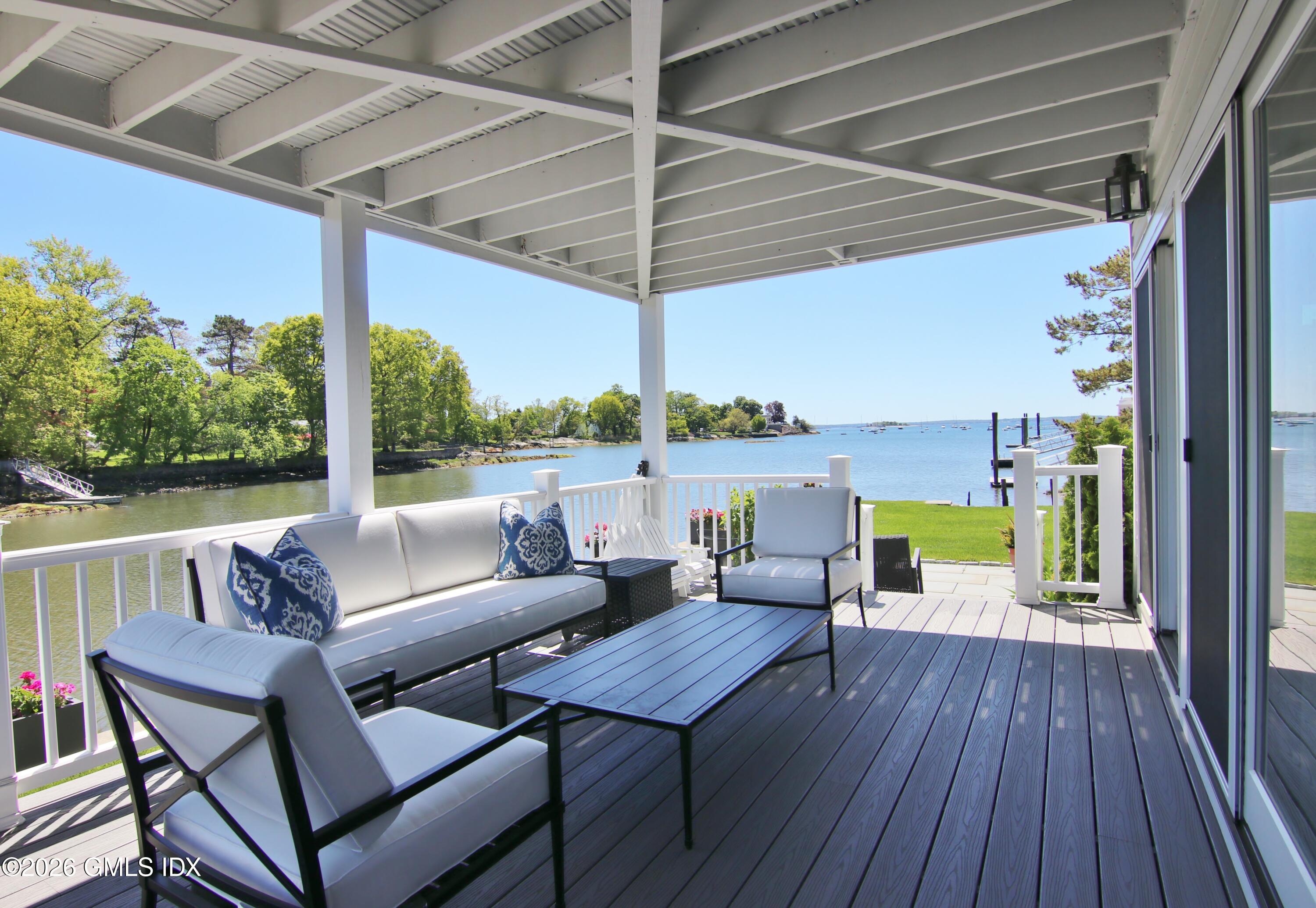 633 Steamboat Road, Unit 5 Greenwich, CT 06830 - Photo 6 of 29 a outdoor living space with furniture and wooden floor