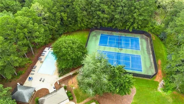 a backyard of a house with lots of green space