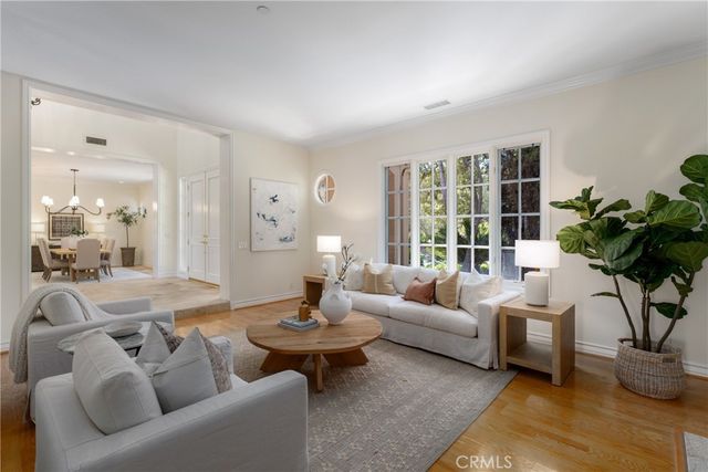 a spacious bedroom with a balcony a bed and a fireplace