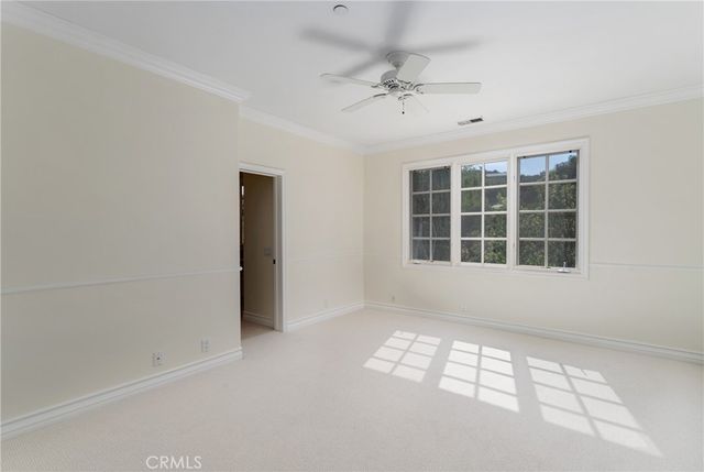 a view of a town with mountains in the background