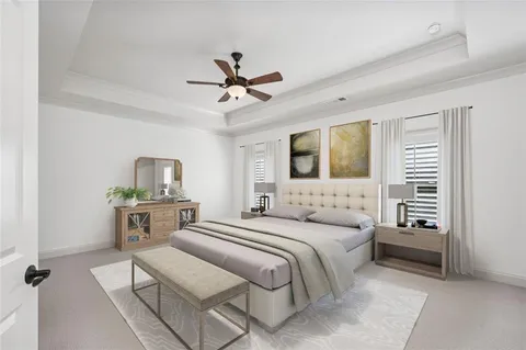 a bedroom with a spacious bed and a window