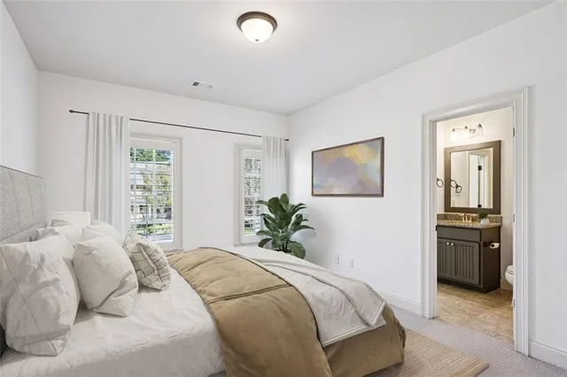 a living room with furniture and large window