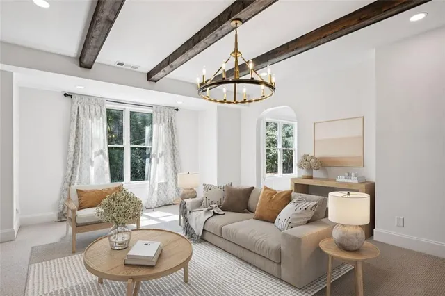 a view of sitting area with furniture and wooden deck