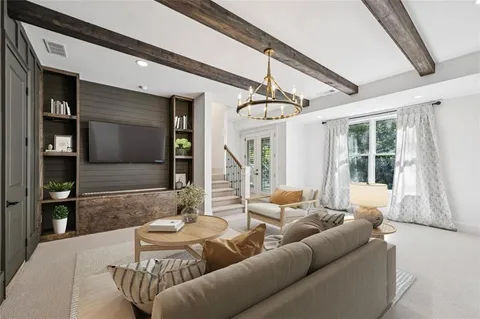 a view of a big yard with large trees