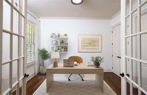 a kitchen with counter top space cabinets and stainless steel appliances
