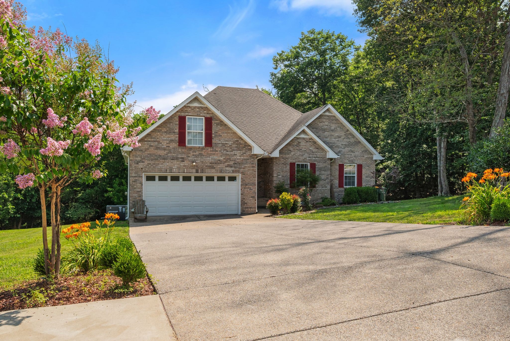 4223 Birmingham Road Lebanon, TN 37090 - Photo 1 of 30 a front view of a house with a yard and potted plants
