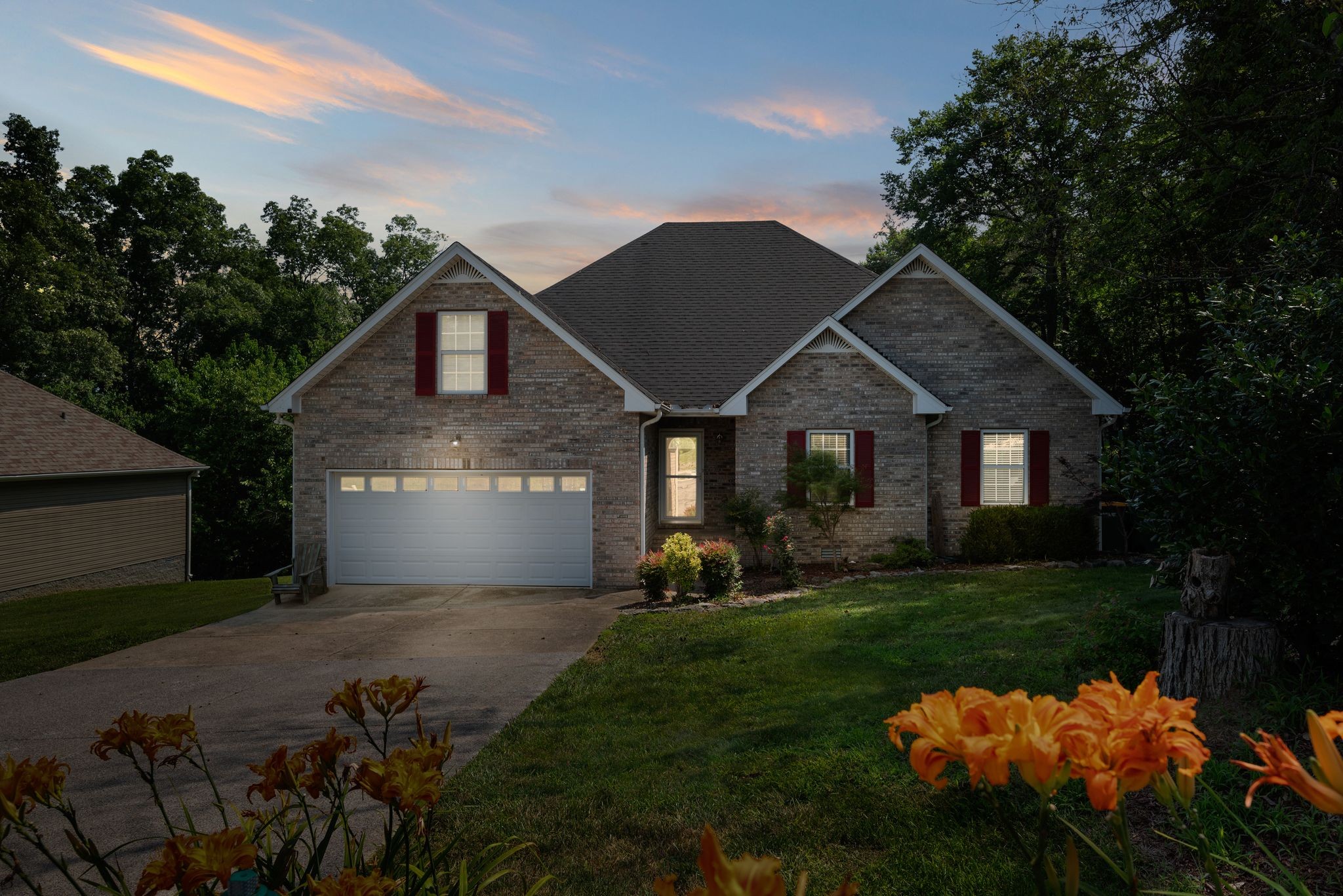 4223 Birmingham Road Lebanon, TN 37090 - Photo 30 of 30 a front view of a house with a garden and yard