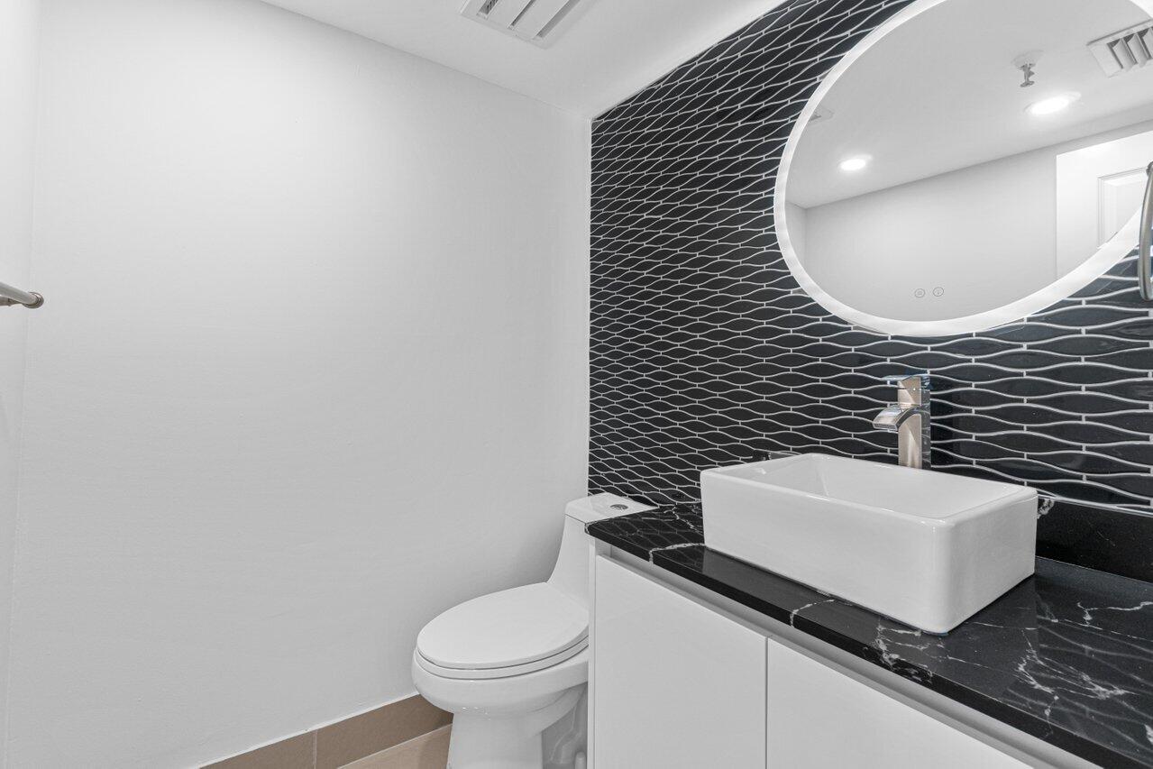859 Jeffery Street, Unit 609 Boca Raton, FL 33487 - Photo 12 of 34 half bathroom