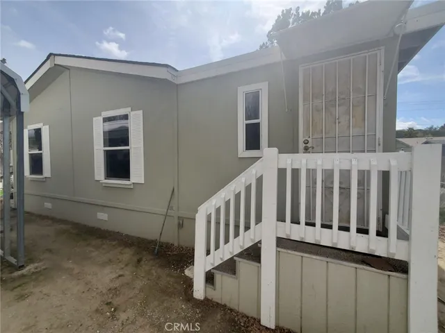 a view of entryway with a house