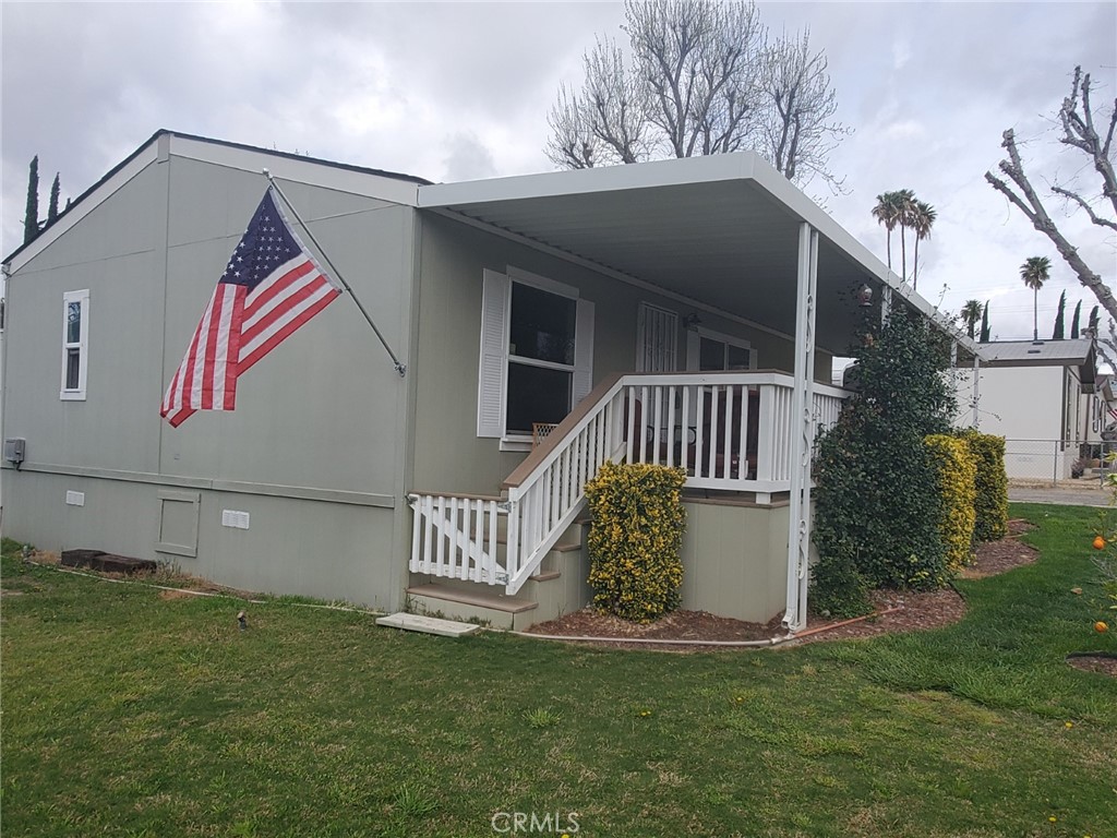 29021 Bouquet Canyon Road, Unit 317 Saugus, CA 91350 - Photo 6 of 24 a front view of a house with garden
