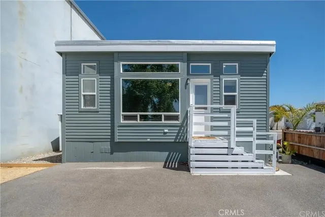 a view of outdoor space and front view of a house