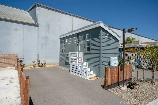a balcony with view of the house